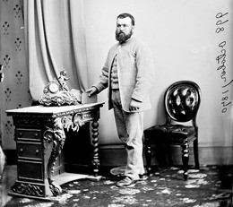 Constable Knapp standing next to a desk