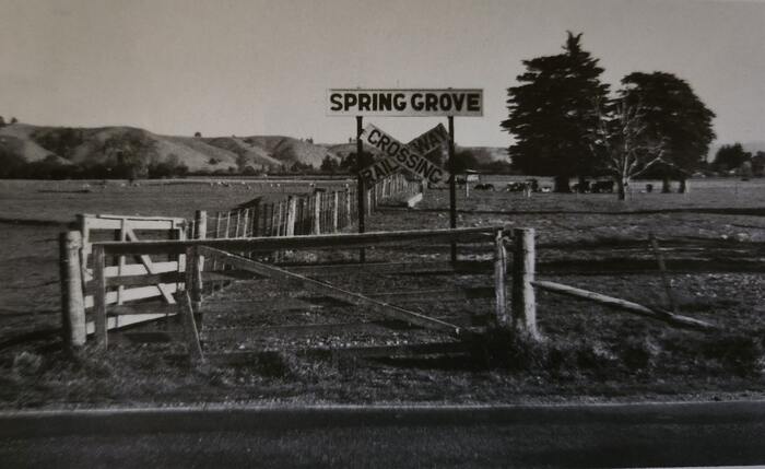 A black and white photo of Spring Grove Railway crossing, 1987.